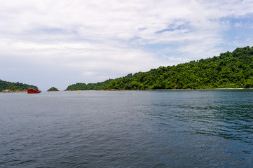 Sea water and beautiful green mountains