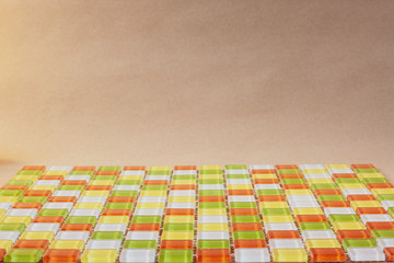 Warm-colored multi color tiles. Construction material texture.