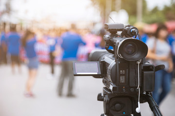 Closeup, video camera working for record TV news.