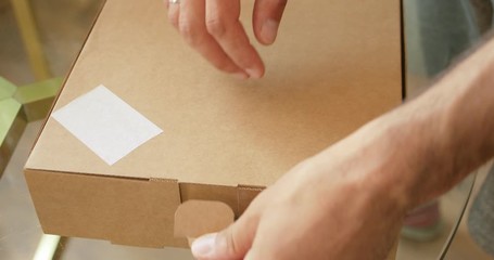 Delicious sweet colorful donuts in takeaway box