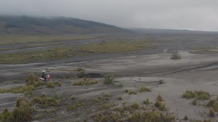Motorcyclist traveling in mountains