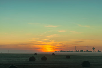 A summer sunrise with tender perl colors and mistic mist 