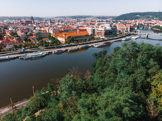 Fototapeta premium Scenic summer sunrise aerial view of the Old Town pier architecture and Charles Bridge over Vltava river in Prague, Czech Republic, travel tour to Europe concept design.