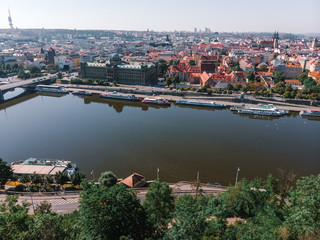 Fototapeta premium Scenic summer sunrise aerial view of the Old Town pier architecture and Charles Bridge over Vltava river in Prague, Czech Republic, travel tour to Europe concept design.