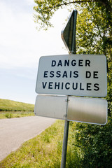 Danger, Essais de vehicules translated freom French as Danger, new vehicles testing near the dedicated for tests highway in France