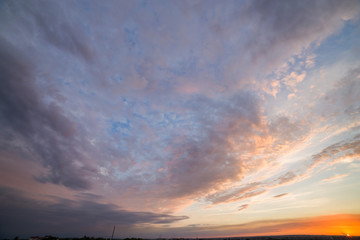 Fototapeta na wymiar Dramatic sunset sky with orange clouds.