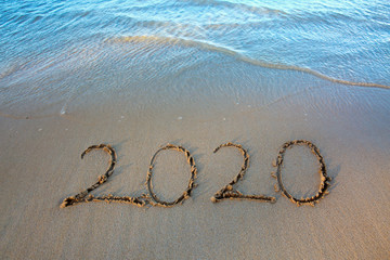 New Year 2020 is coming concept on tropical beach.