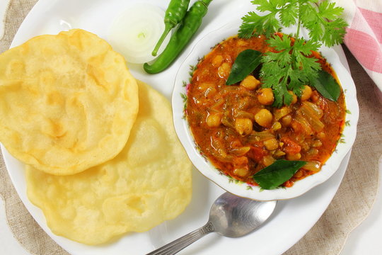 traditional indian punjabi food chole bhature or chole kulcha spicy chick pea curry 