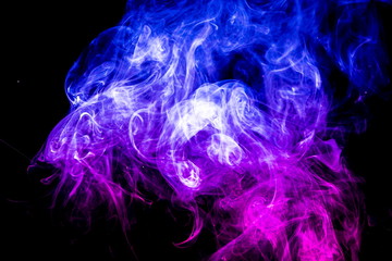 Colored smoke on black background