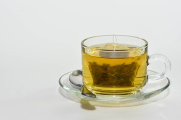 Tea and  Green Tea bag in glass cup is ready to drink