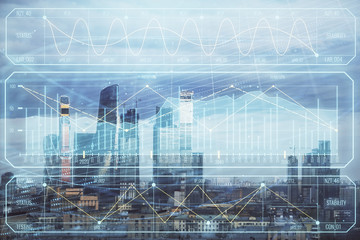 Obraz premium Multi exposure of financial chart on Moscow city downtown background. Concept of stock market analysis