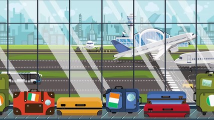Suitcases with Irish flag stickers on baggage carousel in airport. Tourism in Ireland related loopable cartoon animation