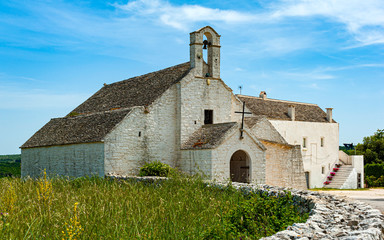 Fototapeta na wymiar The church of Santa Maria di Barsento and the adjacent farm, which was once a convent, are located in the area between Noci and Putignano in the province of Bari
