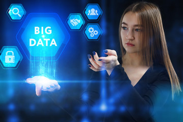 The concept of business, technology, the Internet and the network. A young entrepreneur working on a virtual screen of the future and sees the inscription: Big data