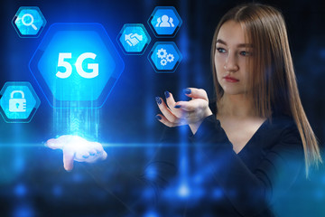 The concept of business, technology, the Internet and the network. A young entrepreneur working on a virtual screen of the future and sees the inscription: 5G