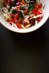 summer salad with fresh bell peppers, cucumbers, dill tomatoes and cabbage