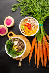 Two spicy bowls with noodles