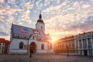 Fototapeta Church of St Mark (Crkva sv Marka) in Zagreb Old city with colourful tiled roof at sunrise. Scenic view of medieval architecture of the historical Upper town (Gradec or Gornij Grad) of Zagreb, Croatia obraz