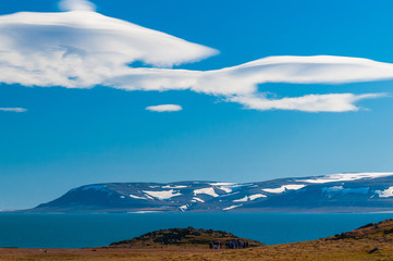 Tourists from a cruise ship hiking on Barentsoya in Svalbard, Norway.