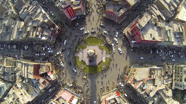 Birdseye zoom-in view of the Faisalabad Clock tower roundabout and streets