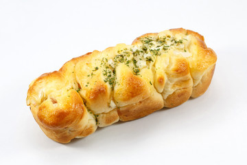 Bread, ham and cheese roll on white background