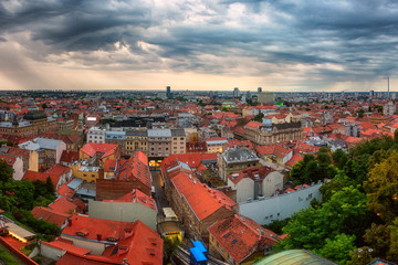 Panoramic view of Zagreb Old city from Lotrscak tower. Scenic cityscape of Lower town with historical buildings and small funicular, popular tourist attraction, Croatia. Outdoor travel background