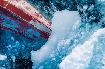 Tuinposter Bow of ice breaker going through ice in the Arctic Circle. © Don Landwehrle