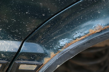 Rust on the body of an old car