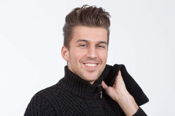 young handsome man in black sweater