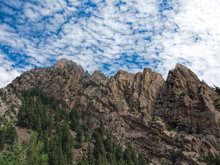 Rocky Mountain Peaks Under Beautiful Clouds