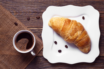 Croissant and cup of coffee