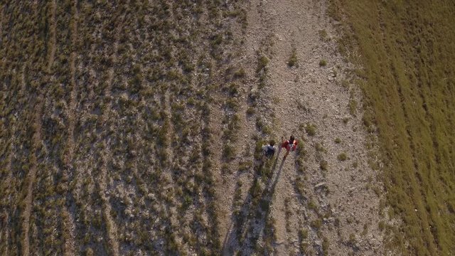 Drone view of two friends hiking in the Apennines, Umbria, Italy