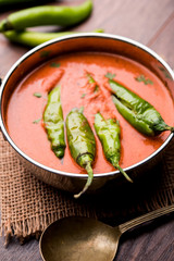 Hyderabadi mirchi ka Salan or green chilly sabzi or curry. Main course recipe from India. served in a bowl. selective focus