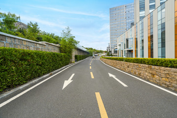 empty highway with cityscape and skyline of qingdao,China.