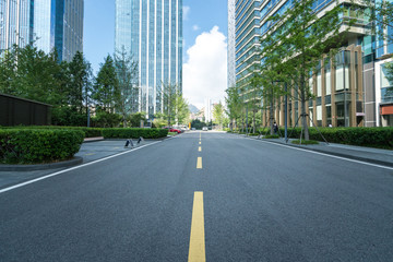 empty highway with cityscape and skyline of qingdao,China.