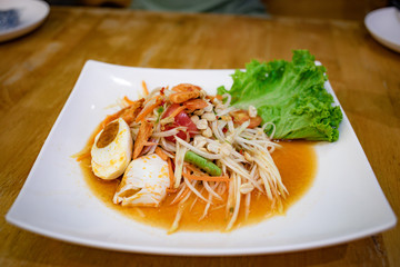Salted egg in papaya salad, Thai food