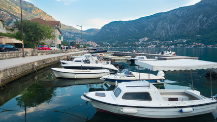 Fototapeta na wymiar Montenegro - Kotor bay. Dobrota. Harbour and boats.