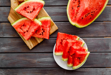 Fresh watermelon on wooden background top view