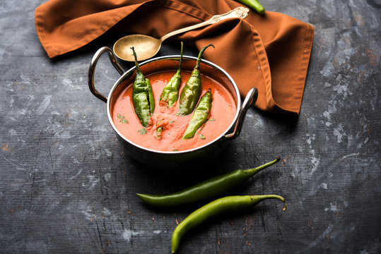 Hyderabadi mirch/mirchi ka Salan or green chilly sabzi or curry. Main course recipe from India. served in a bowl. selective focus