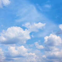 Naklejka na ściany i meble Blue sky with white heap clouds