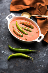 Hyderabadi mirch/mirchi ka Salan or green chilly sabzi or curry. Main course recipe from India. served in a bowl. selective focus