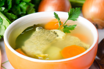 Fish soup served on the table in plate