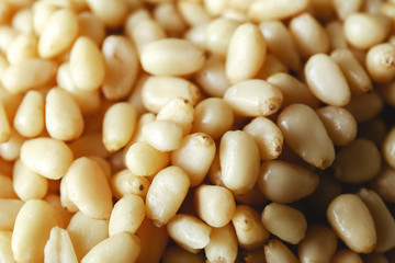 Background texture of shelled pine nuts.