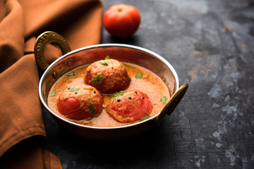 Tomato Salan or Tamatar sabzi or curry. Main course recipe from India. served in a bowl. selective focus