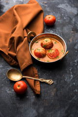 Tomato Salan or Tamatar sabzi or curry. Main course recipe from India. served in a bowl. selective...