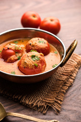 Tomato Salan or Tamatar sabzi or curry. Main course recipe from India. served in a bowl. selective focus