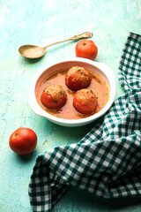 Tomato Salan or Tamatar sabzi or curry. Main course recipe from India. served in a bowl. selective focus