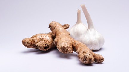Closeup of ginger and garlic isolated in white background