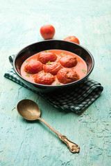 Tomato Salan or Tamatar sabzi or curry. Main course recipe from India. served in a bowl. selective focus