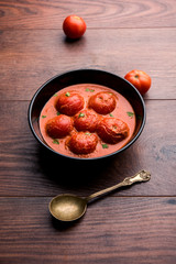 Tomato Salan or Tamatar sabzi or curry. Main course recipe from India. served in a bowl. selective...